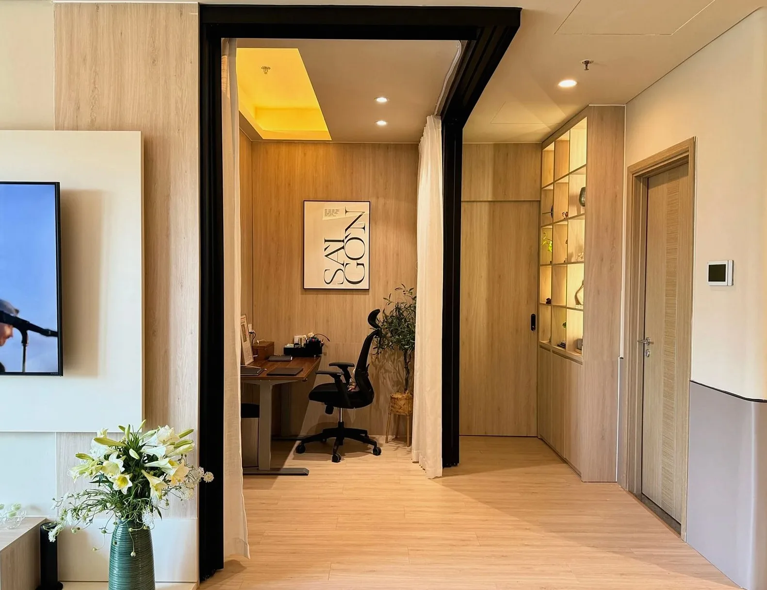 Corridor leading to a small wood-panelled office